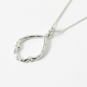 Vintage Avon (produced by SAQ Manufacturing) silver finish necklace/cz & pendant